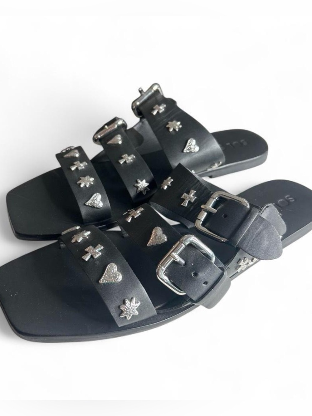 Sol Sana Eastwood leather slide with silver heart, cross, and star studs